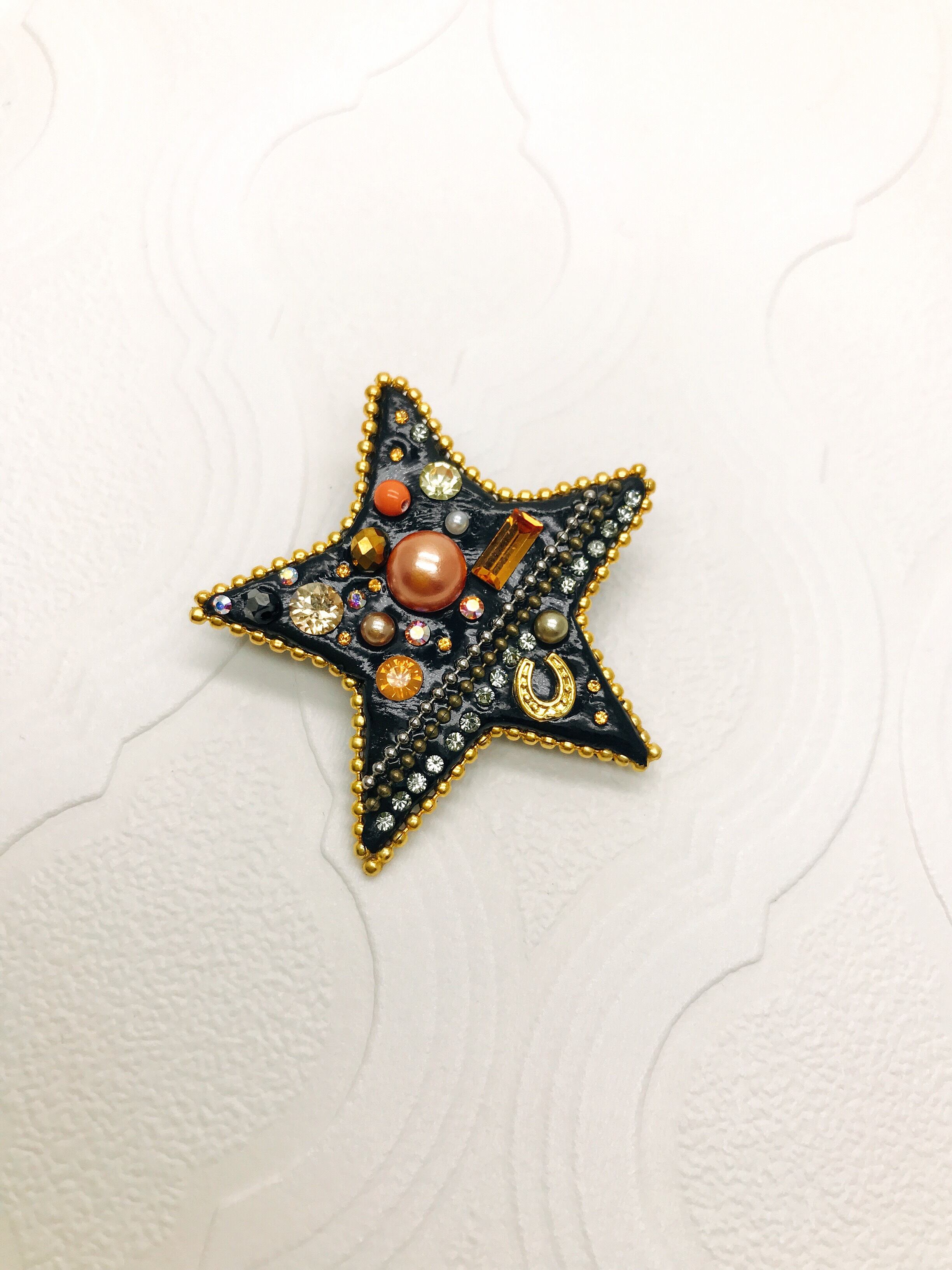 ホースシュースターブローチ