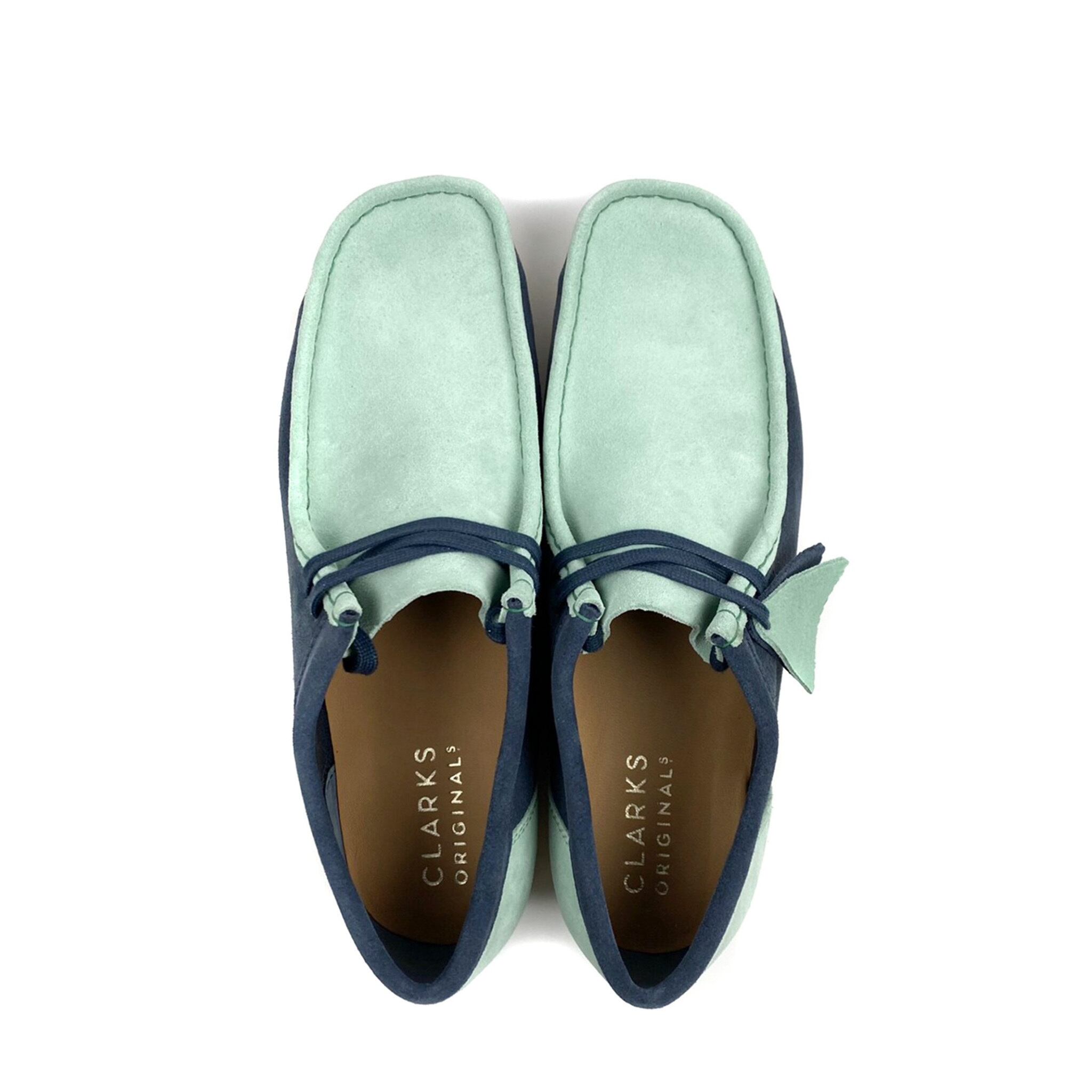 green and blue wallabees