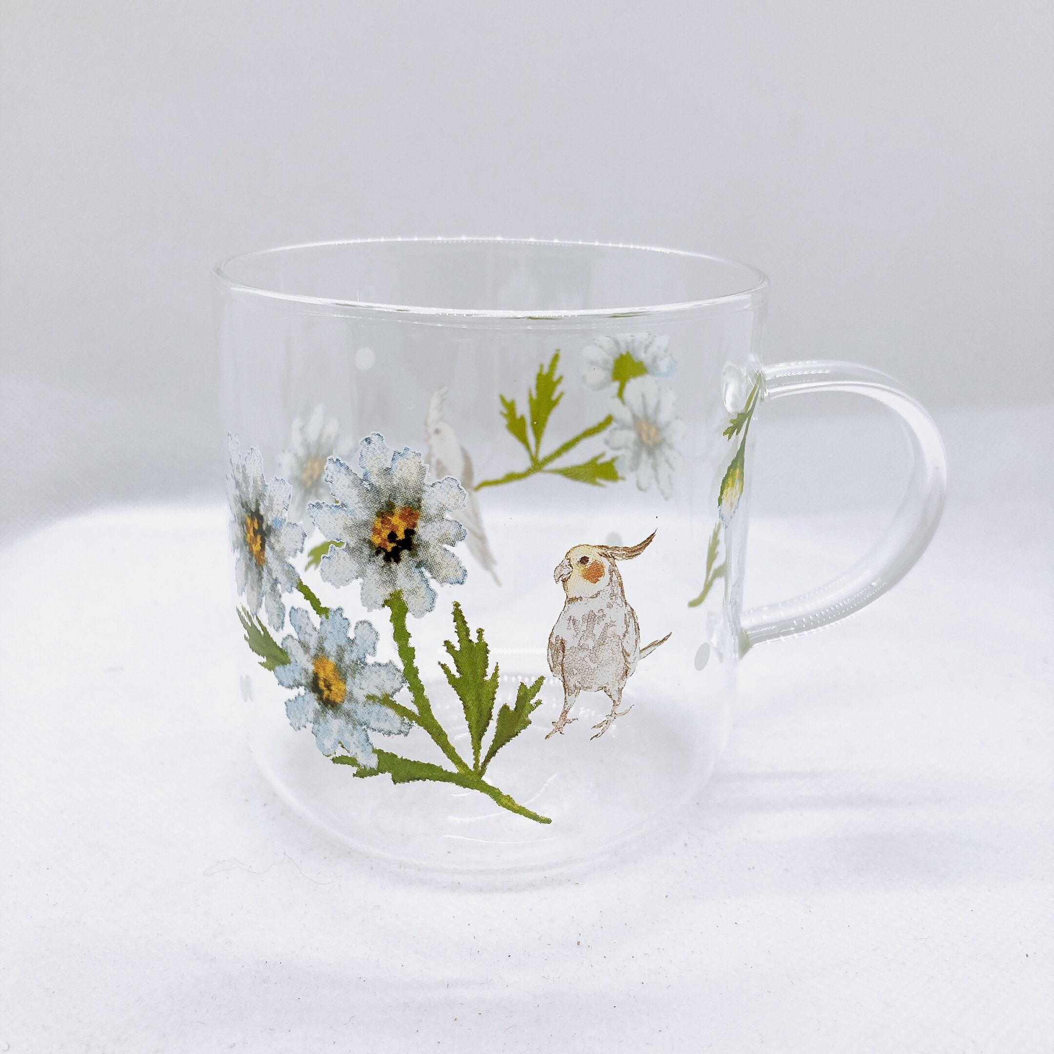 オカメインコとデイジー柄の耐熱マグカップ(コルクコースター付