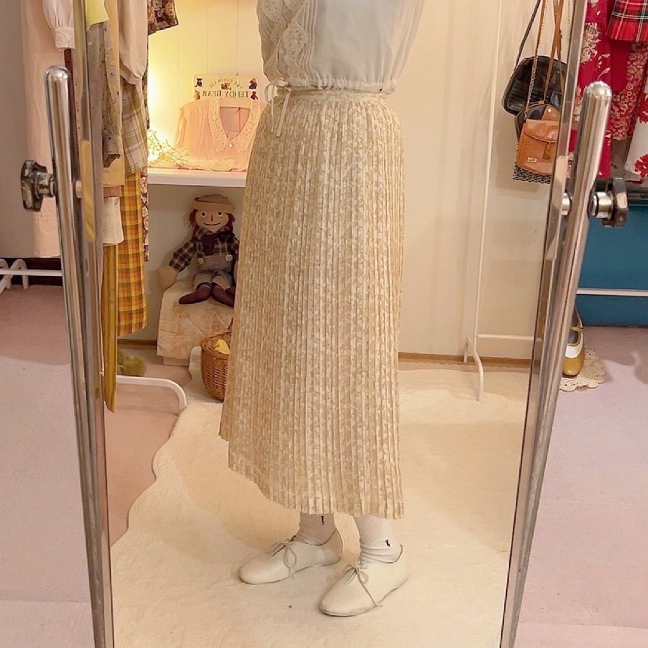 clear mini rose pleats skirt