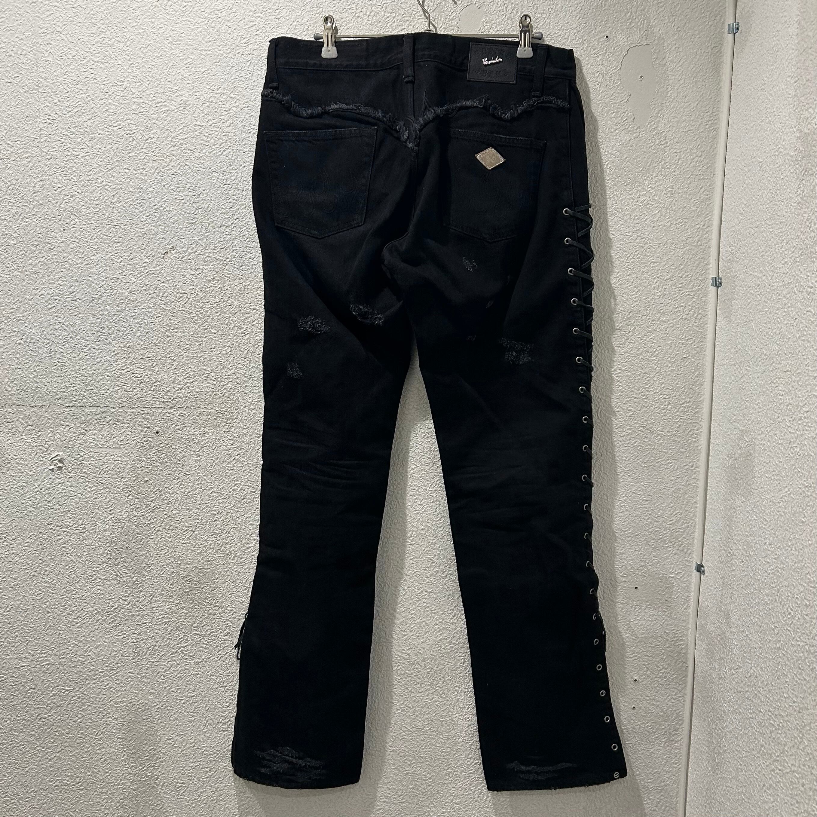 el conductorH コンダクター LACE UP DISTRESSED JEAN TROUSERS 2023 