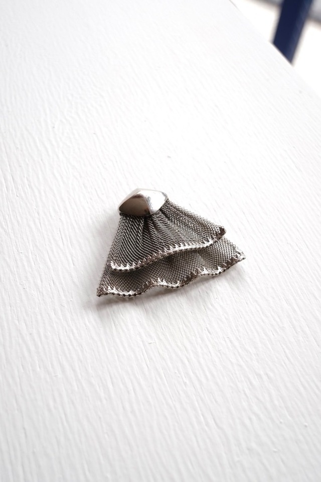 Silver frilled dress clip