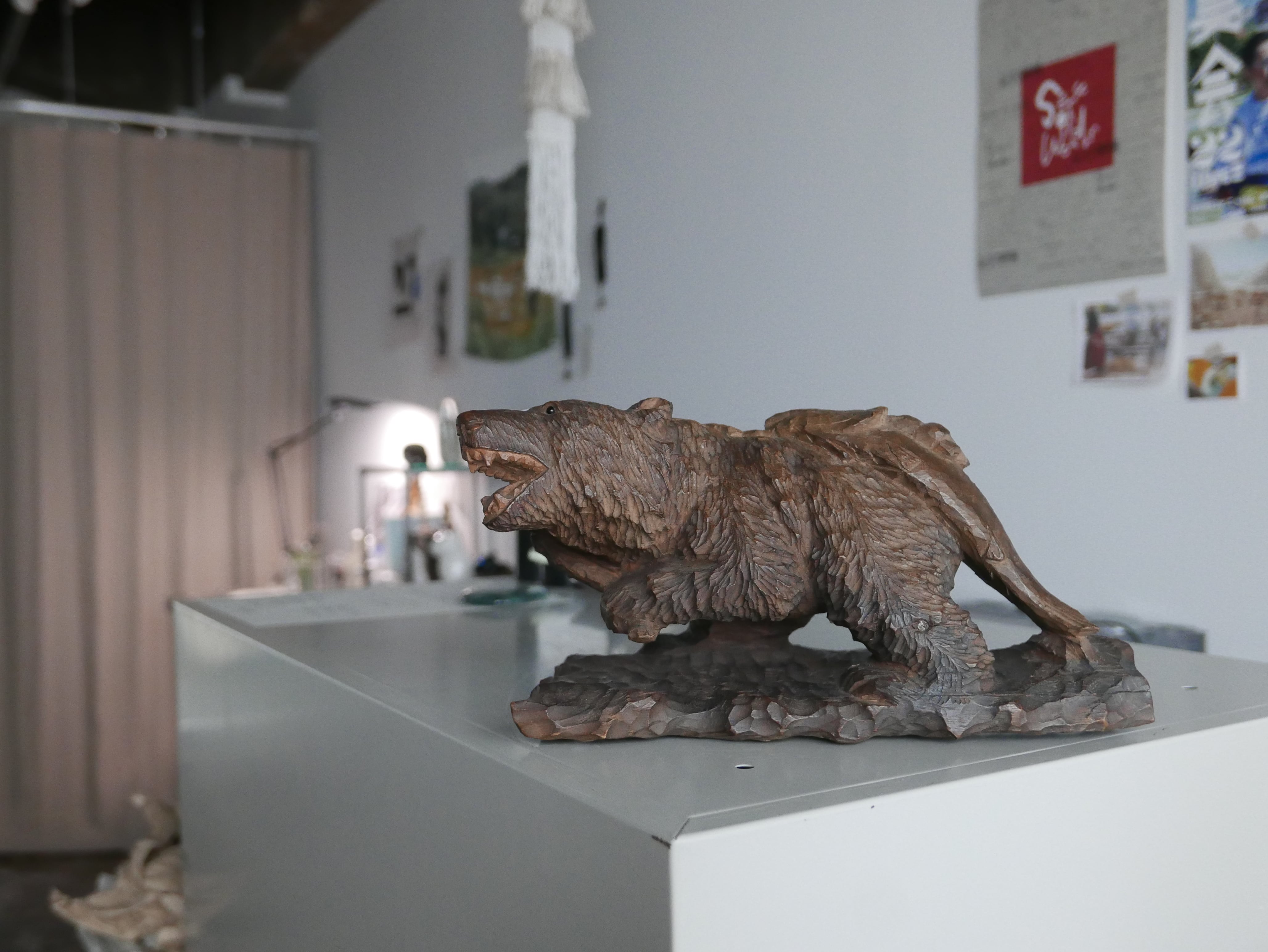 vintage wooden bear , on the board