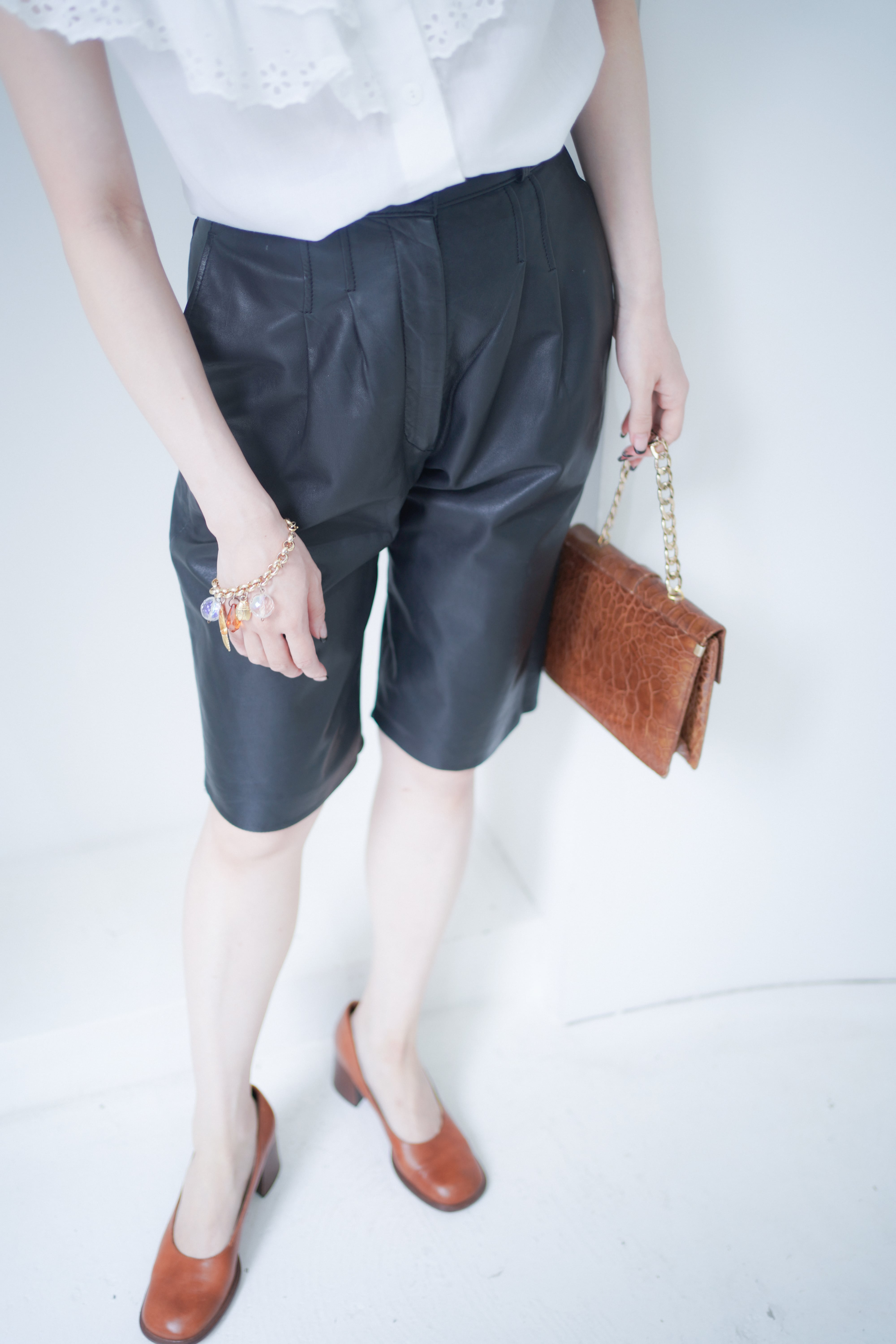 black leather shorts