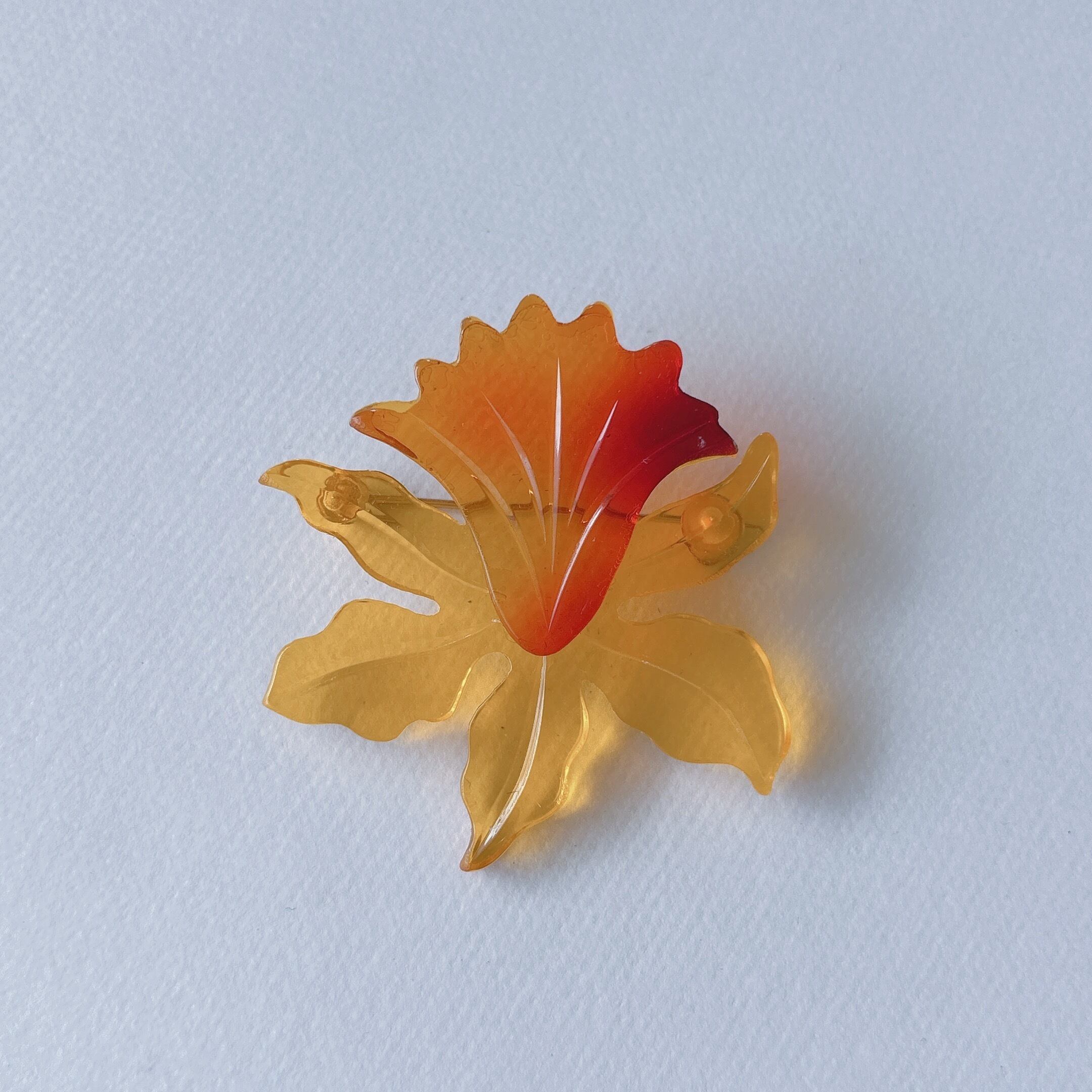 Vintage yellow orange amber acrylic plastic flower cattleya brooch