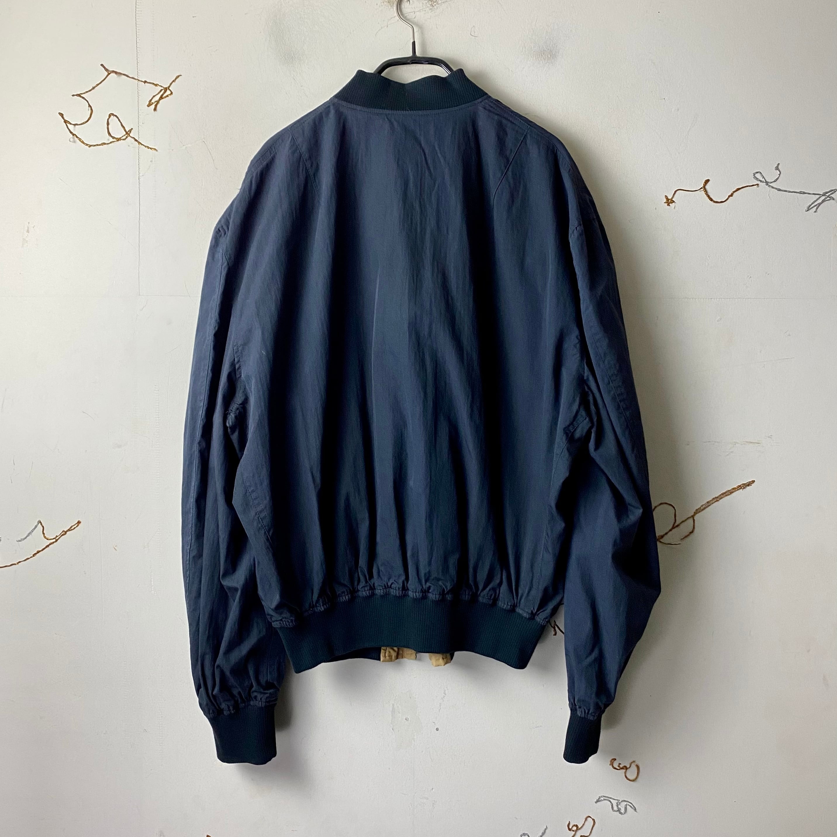 old Mr.JUNKO logo print reversible bomber jacket | NOIR ONLINE old Mr.JUNKO logo print reversible bomber jacket | NOIR ONLINE