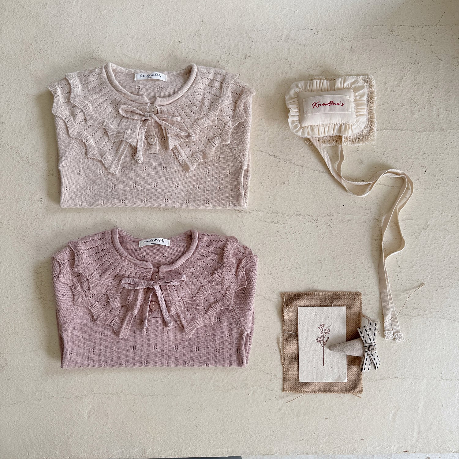 透かし編みニットロンパース