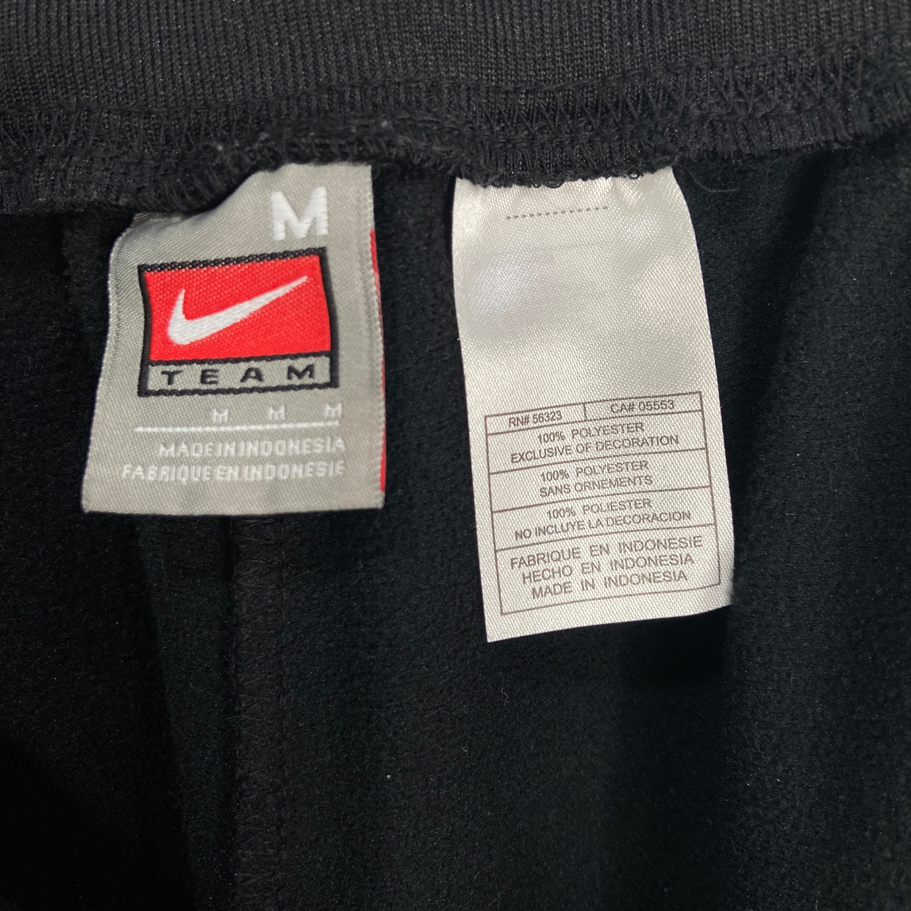 送料無料』NIKE ナイキ トラックジャージパンツ スナップパンツ 刺繍