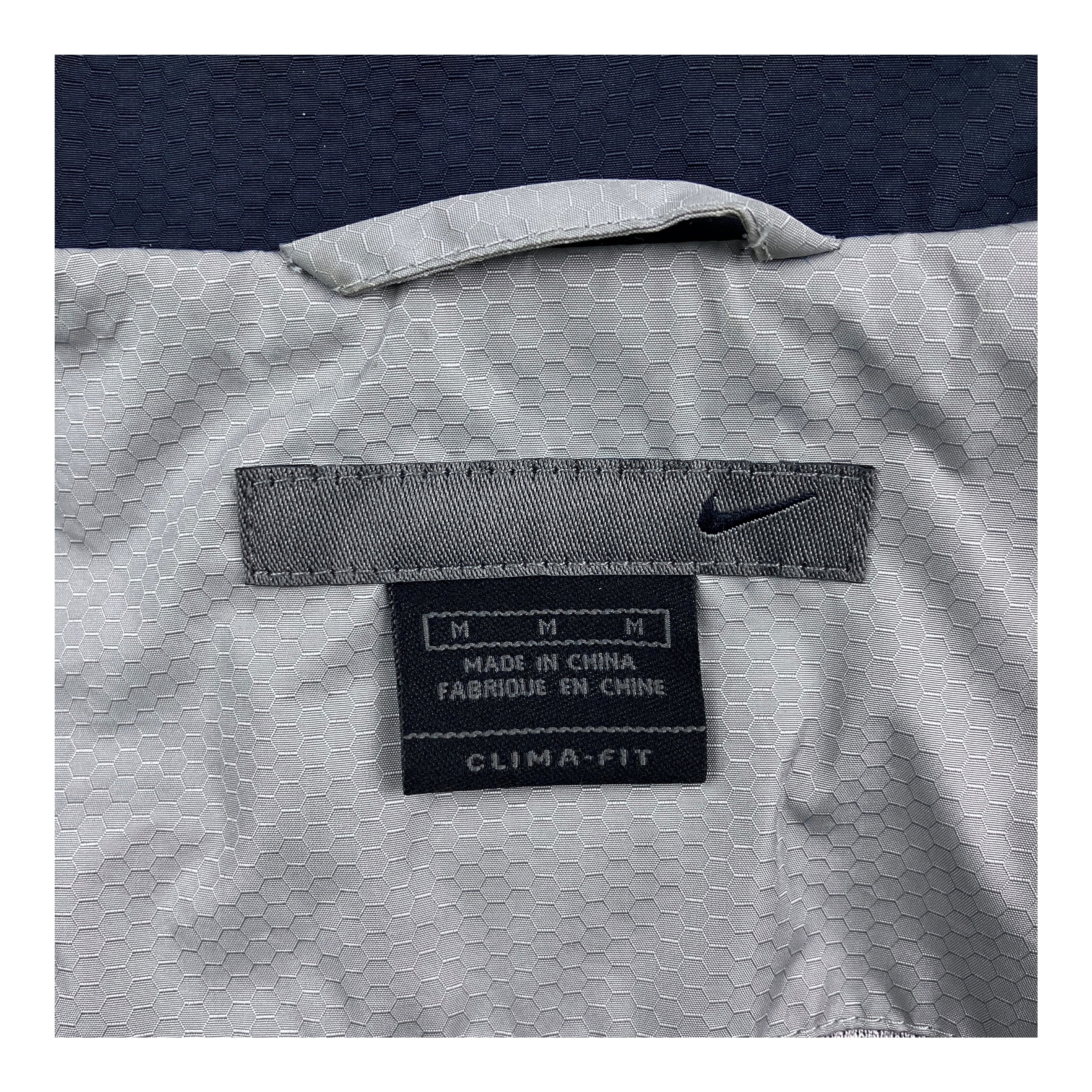 2002s NIKE full zip honeycomb rip nylon jacket | MARKET