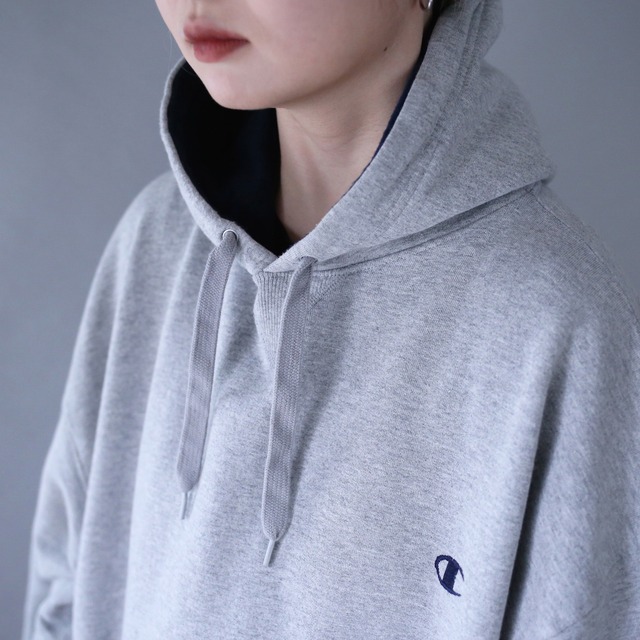 "Champion" light gray color over silhouette sweat parka