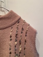 Sleeveless turtleneck knit top