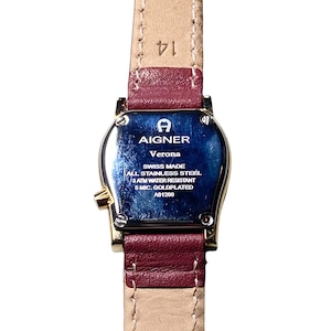AIGNER horseshoe case × shell dial quartz watch “Verona”