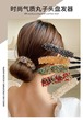 水晶のヘアアイロンの編み物の形が怠け者です。