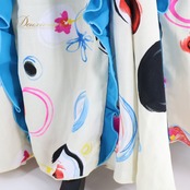 【フラメンコ衣装】アイボリー CANELA PURA ワンピース ドレス 水色 ボウタイ マルチ カラフル 明るい 軽い 薄い 青 ピンク