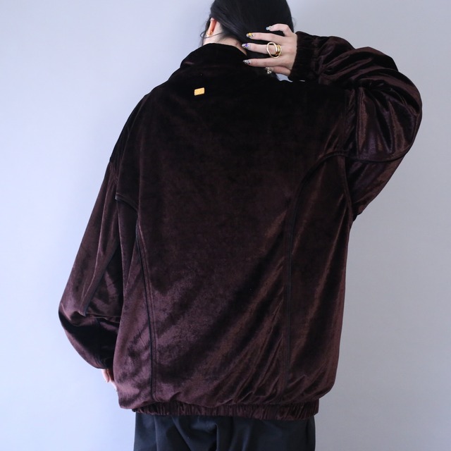 piping and gold zip and plate design over silhouette velours track jacket