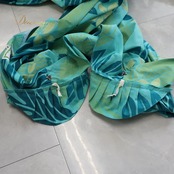 フラダンス 衣装 MENEHUNE PLANTETION メネフネプランテーション ワンピース ドレス ブルー系 ラウアエ柄 プルメリア柄 アシンメトリー パフスリーブ かわいい 華やか 鮮やか 明るい アロハ ハワイアンプリント フラ ダンス レッスン 練習