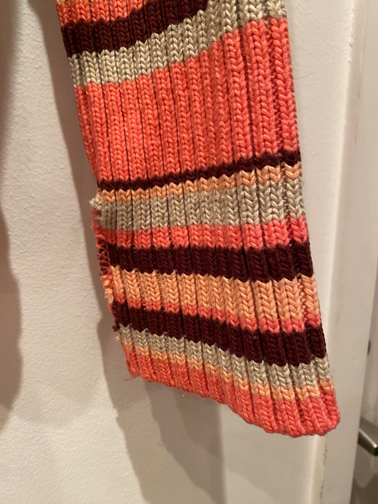 Border design turtleneck knit top