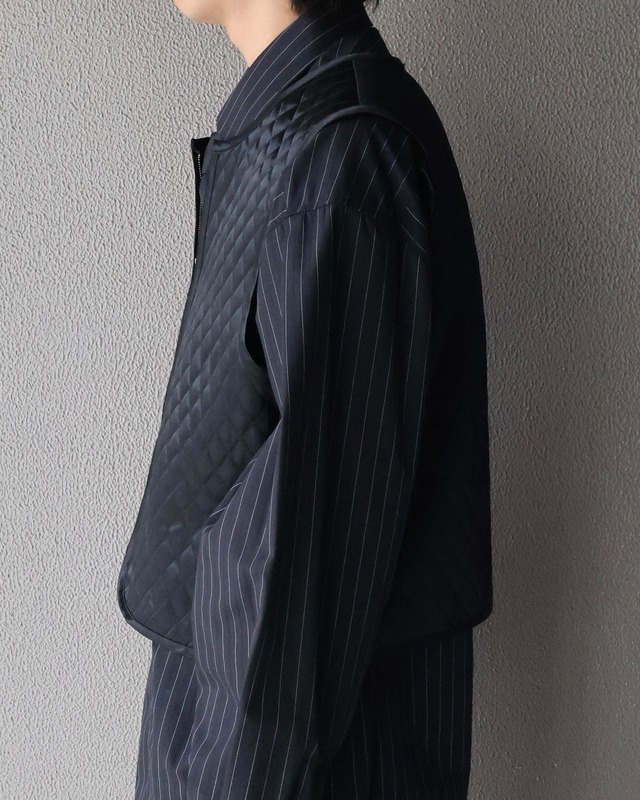 Quilted short length zip vest