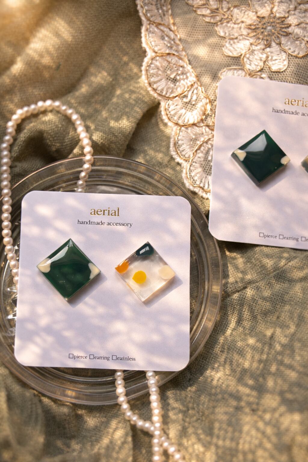 clear × green｜ニュアンスピアス / イヤリング