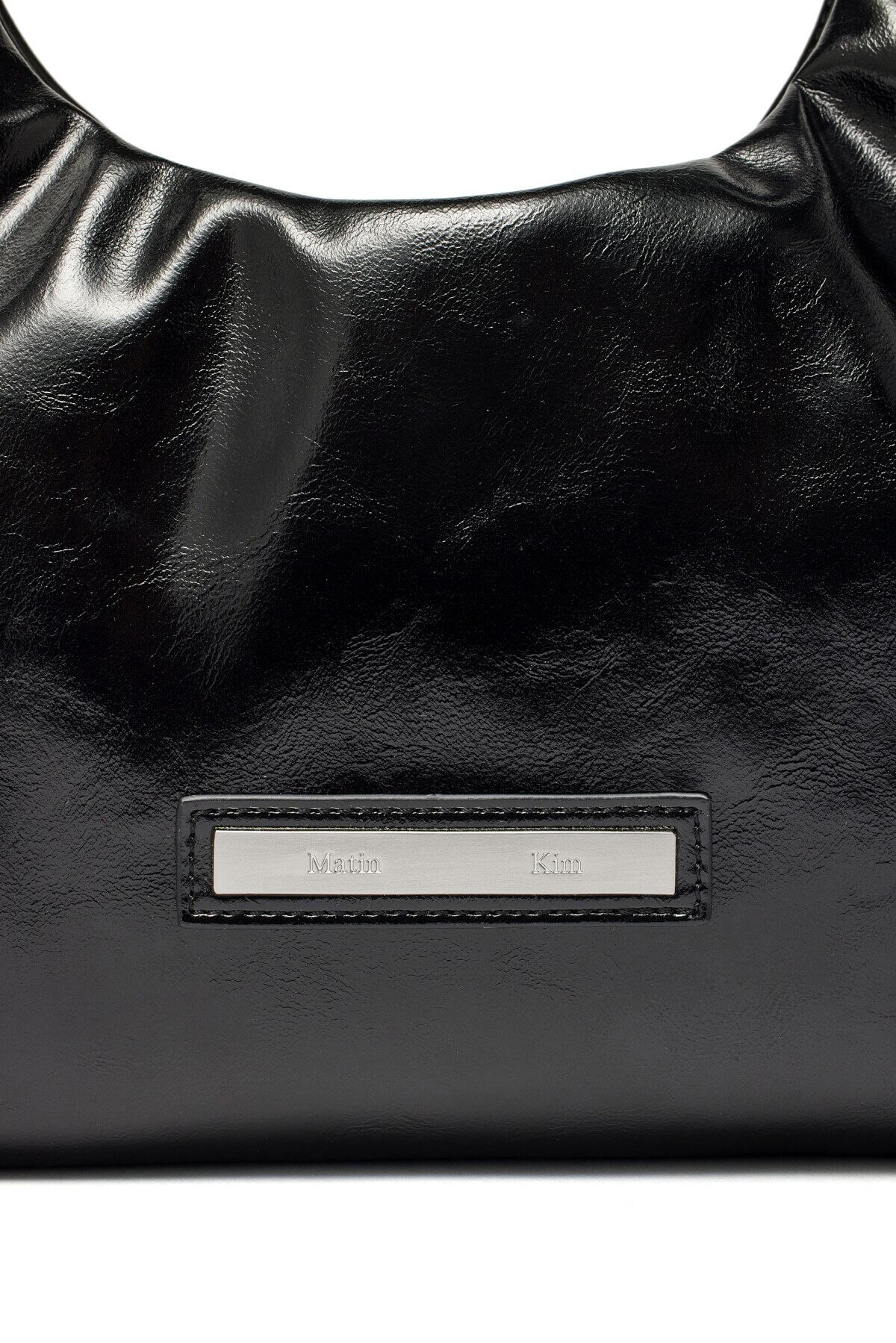 Matin Kim] EMBOSSED LOGO LEATHER MINI TOTE BAG IN BLACK 正規