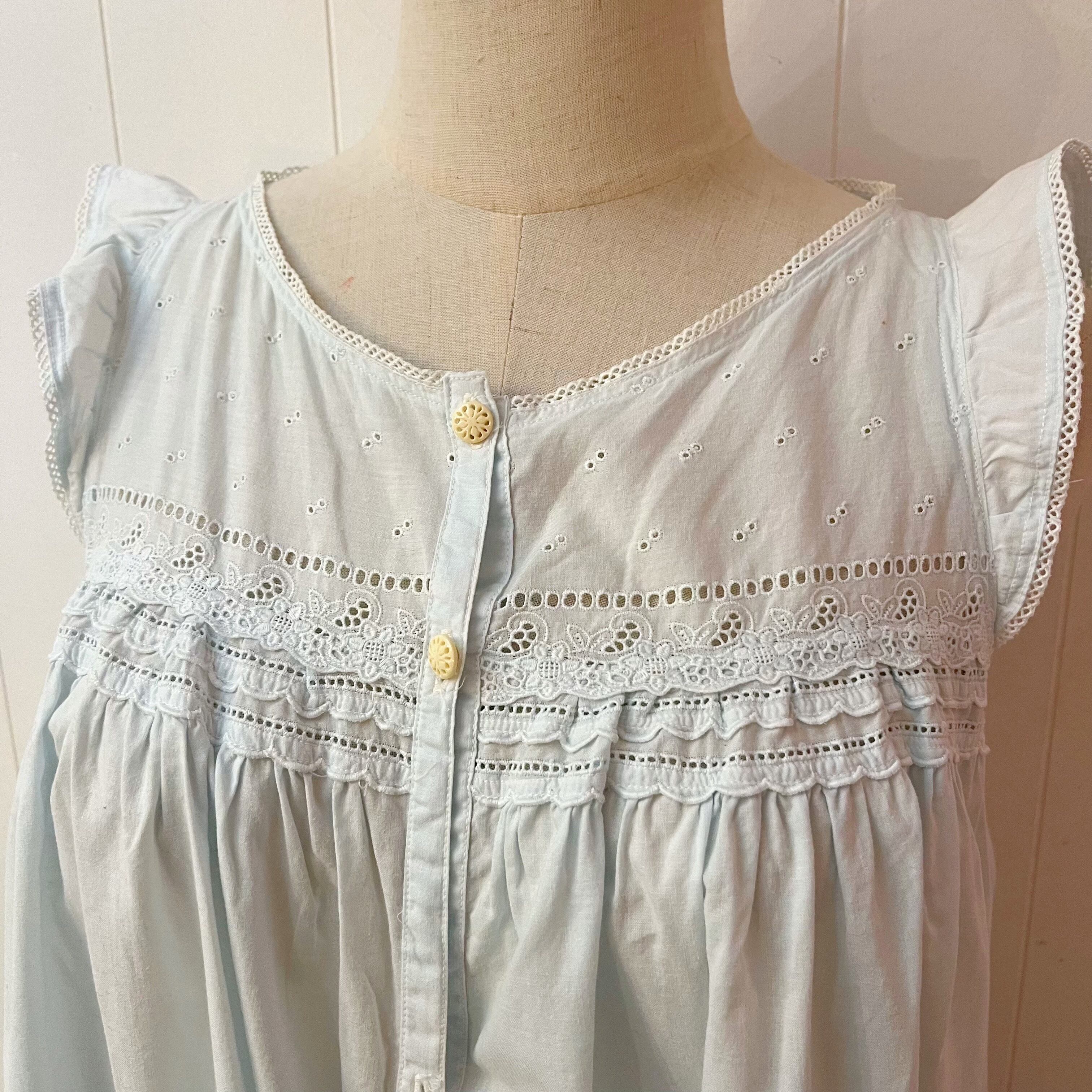 light blue sleeve less one-piece