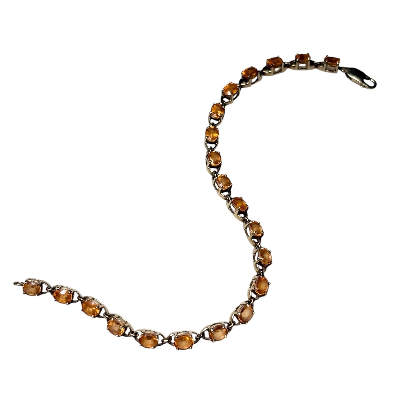vintage 9ct gold tennis bracelet set with orange sapphire