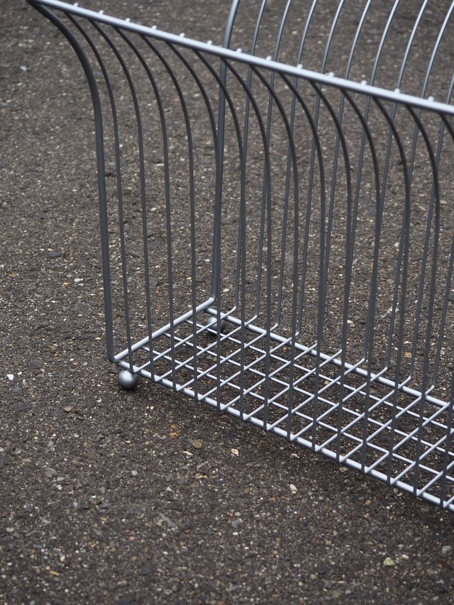 Grey wire magazine rack