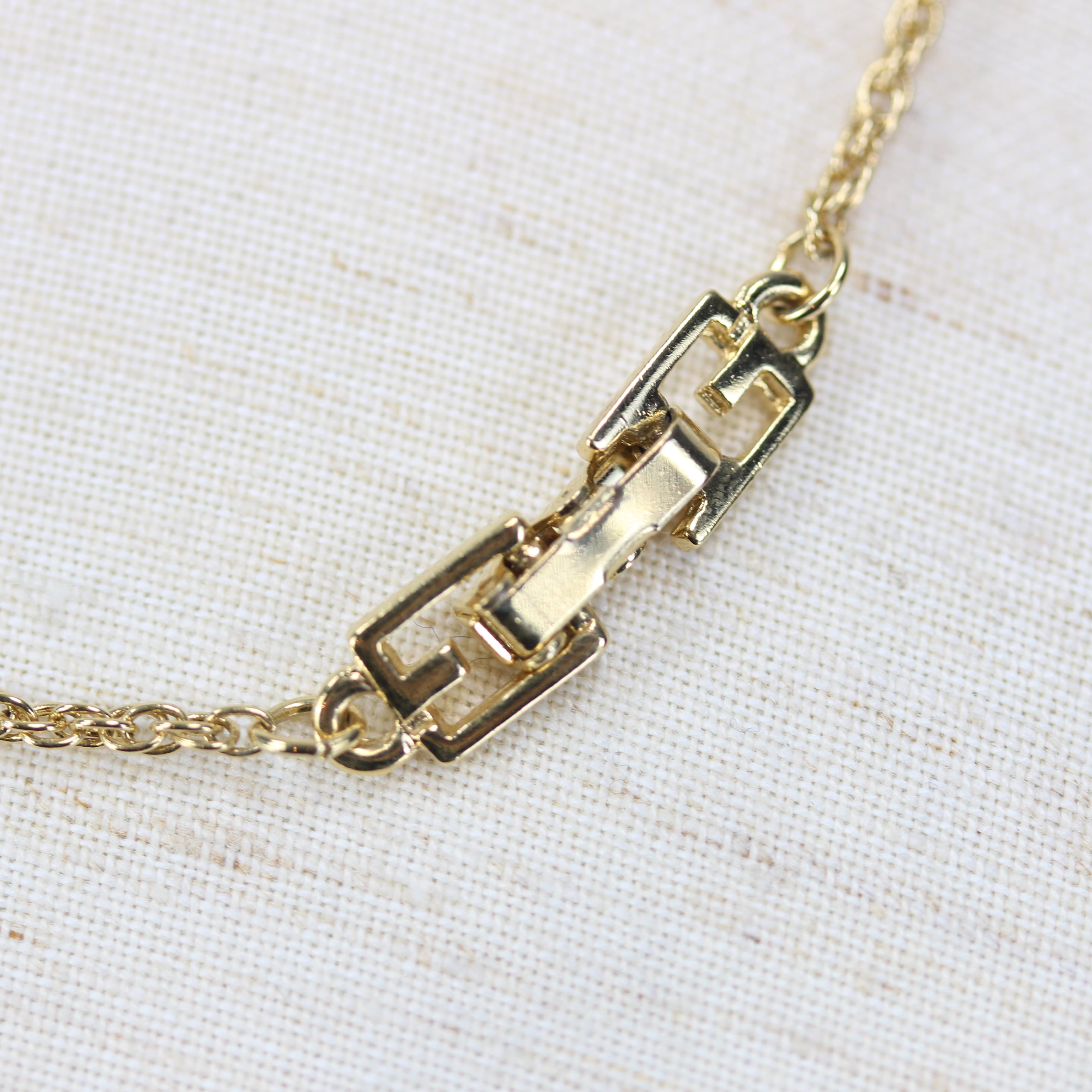 GIVENCHY CLEAR STONE RIBBON DESIGN NECKLACE/ジバンシィクリア