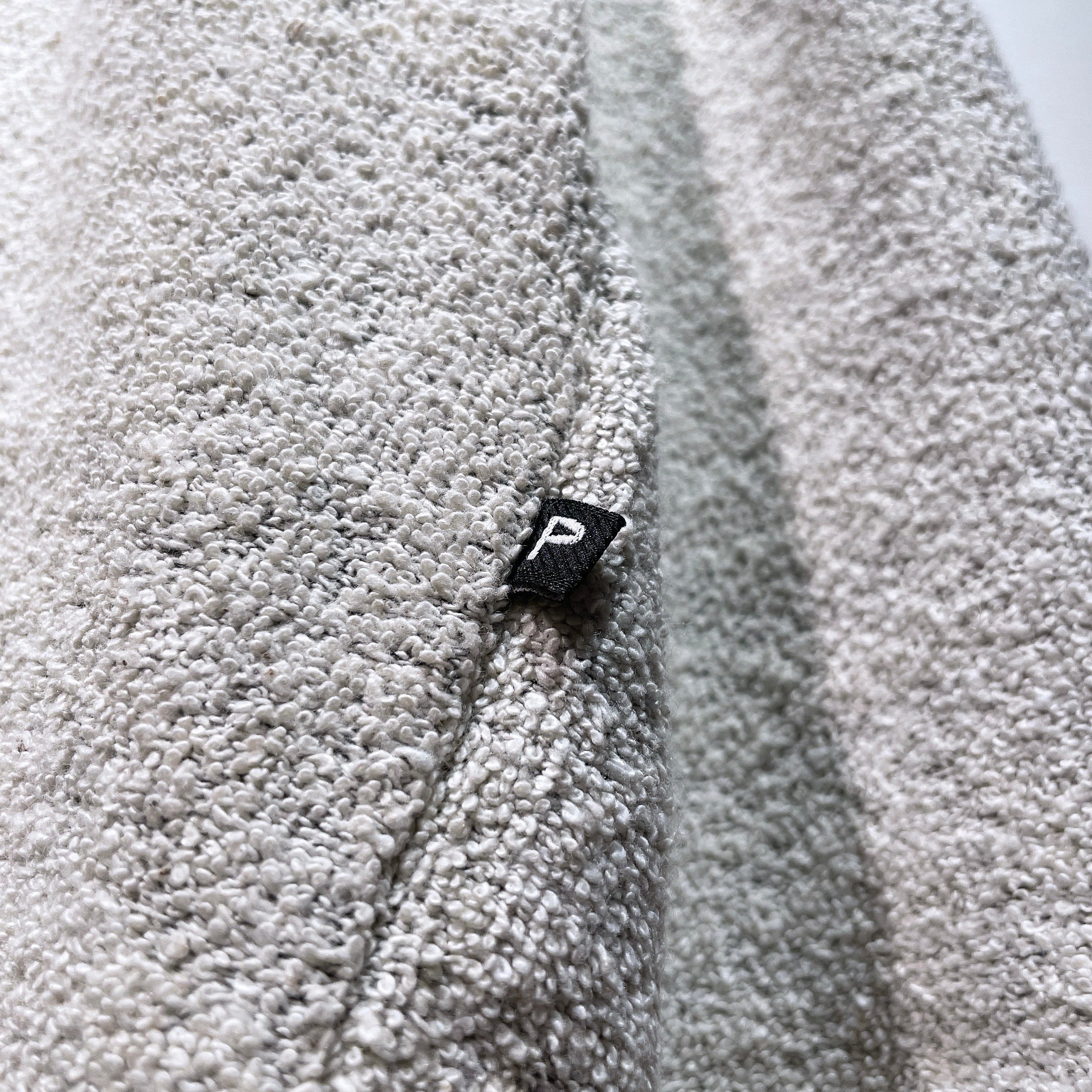 Ecru white color solid nep embroidery cotton knit