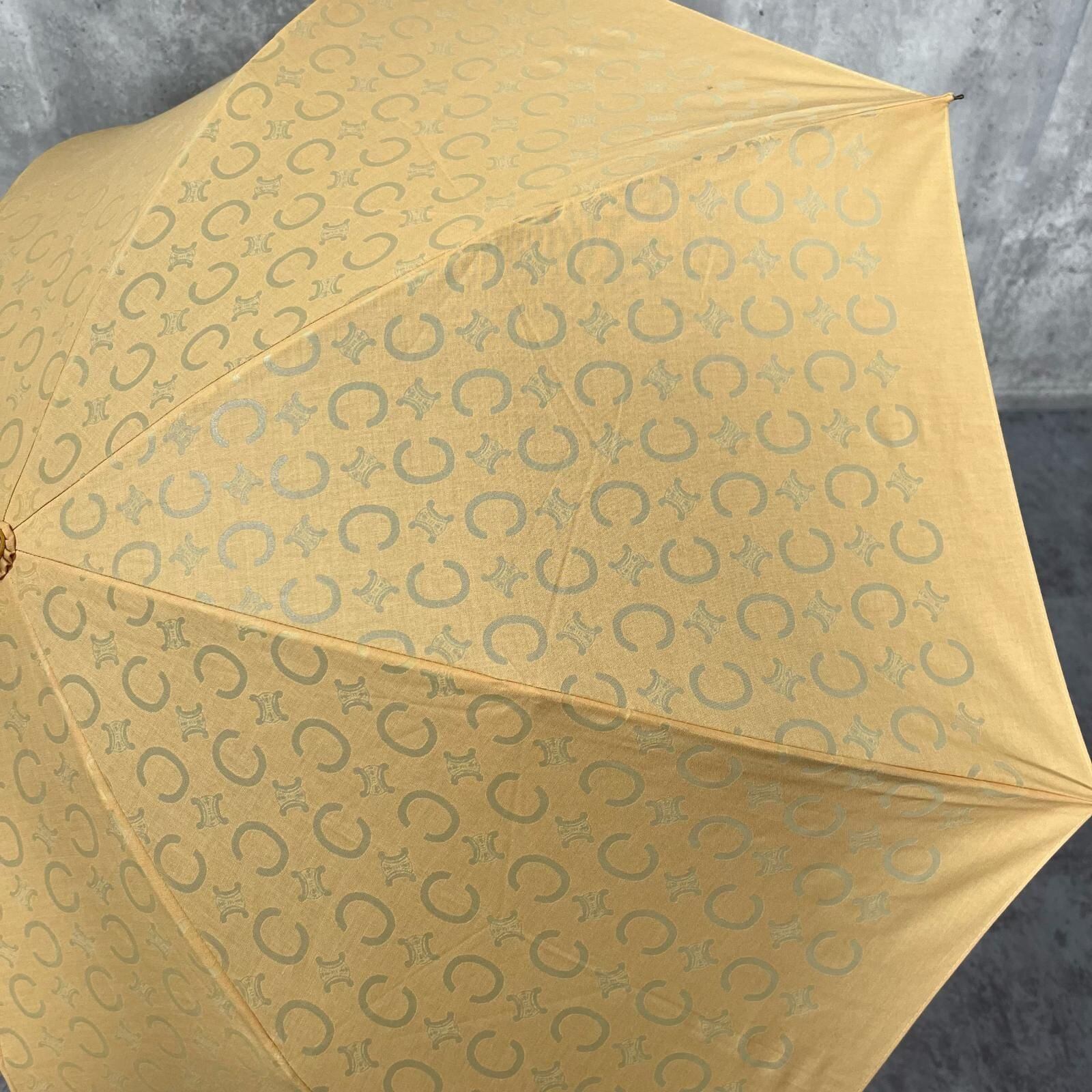 CELINE セリーヌ 日傘 雨傘パラソル トリオンフ柄ゴールド金具タグ付　新品 CELINE】セリーヌ 折りたたみ傘 マカダム柄 オレンジ イエロー系