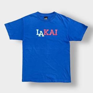 【LAKAI】USA製 ロゴ Tシャツ バックプリント 99 ナンバリング スケボー ラカイ ブルー M US古着