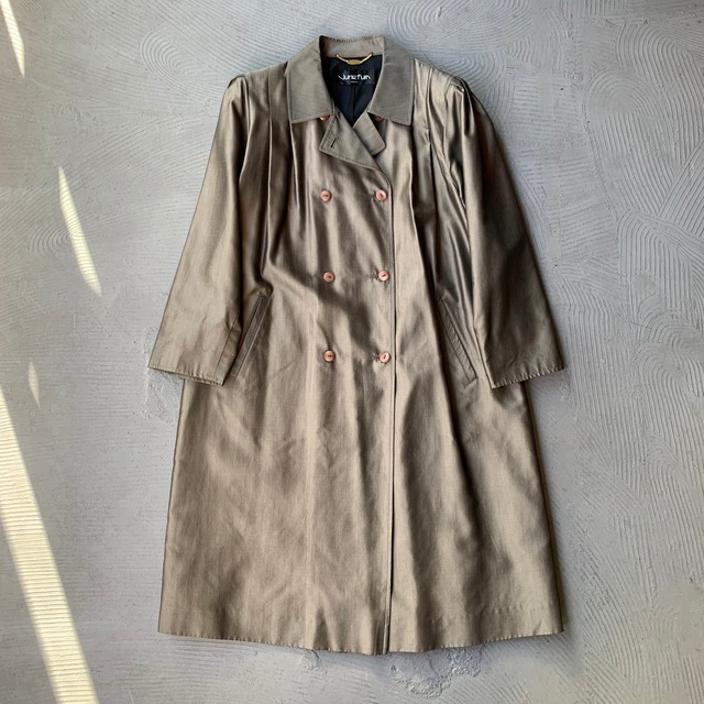 Tuck designed trench coat
