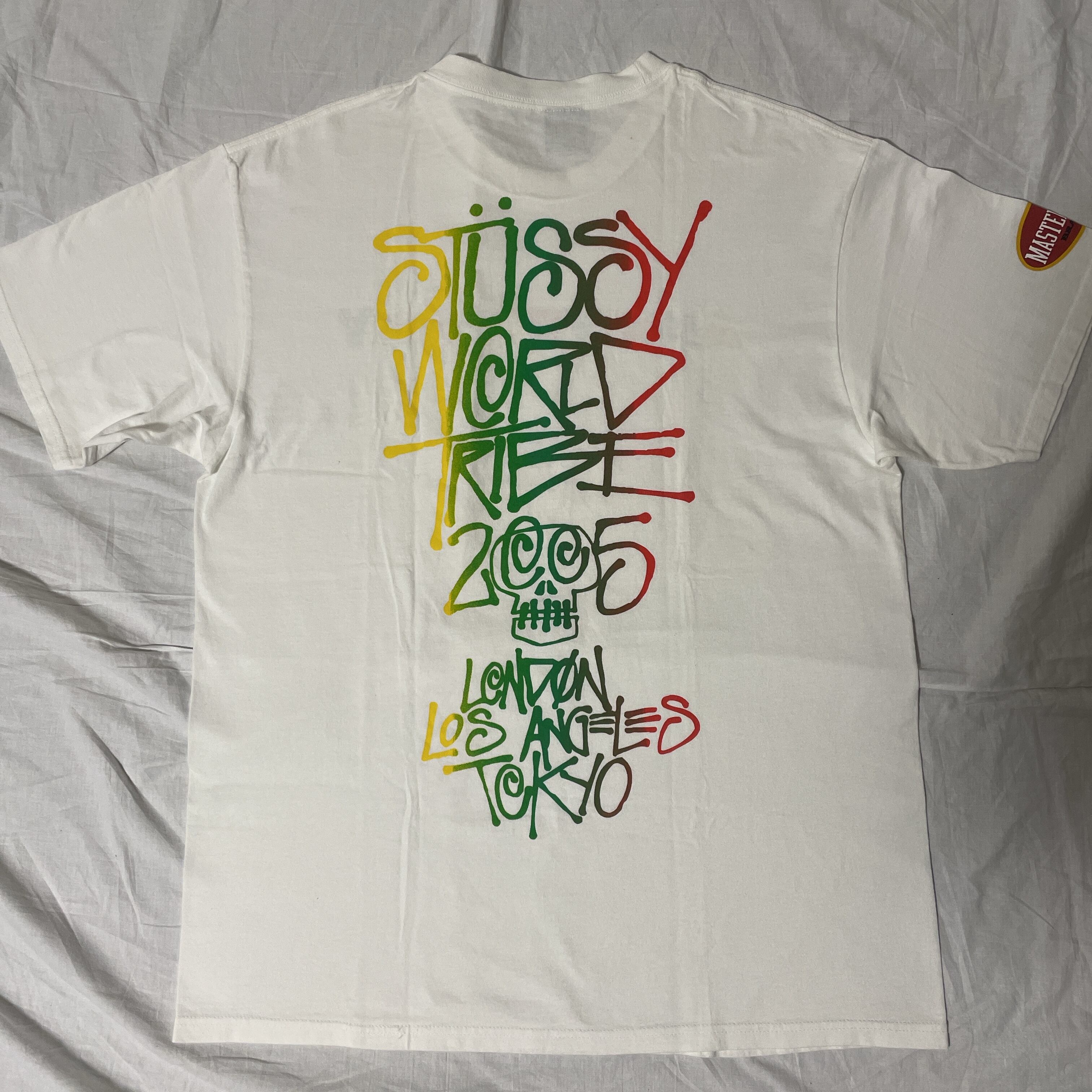 STUSSY WORLD TRIBE MASTER PIECE TEE | Lookin'4