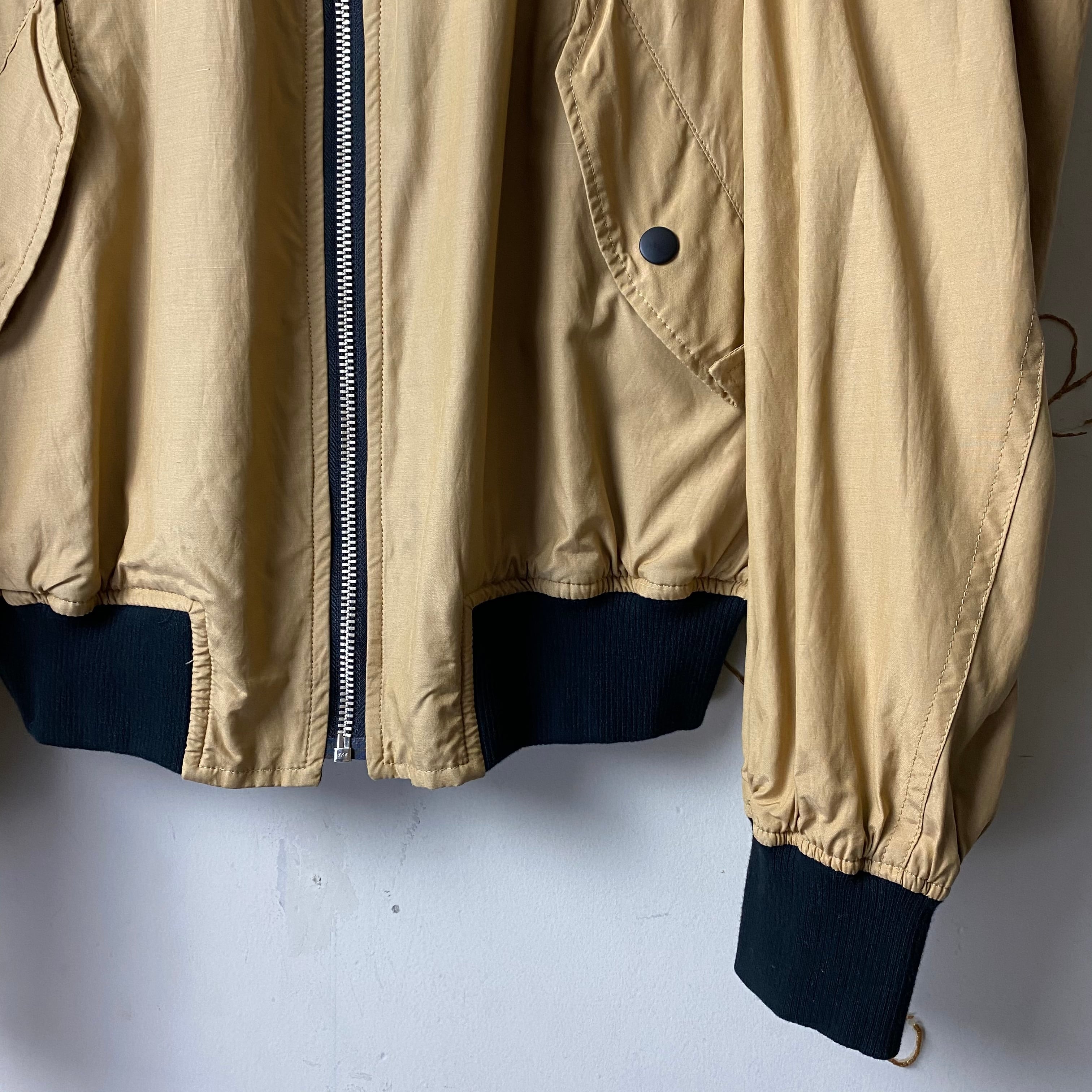 old Mr.JUNKO logo print reversible bomber jacket | NOIR ONLINE old Mr.JUNKO logo print reversible bomber jacket | NOIR ONLINE