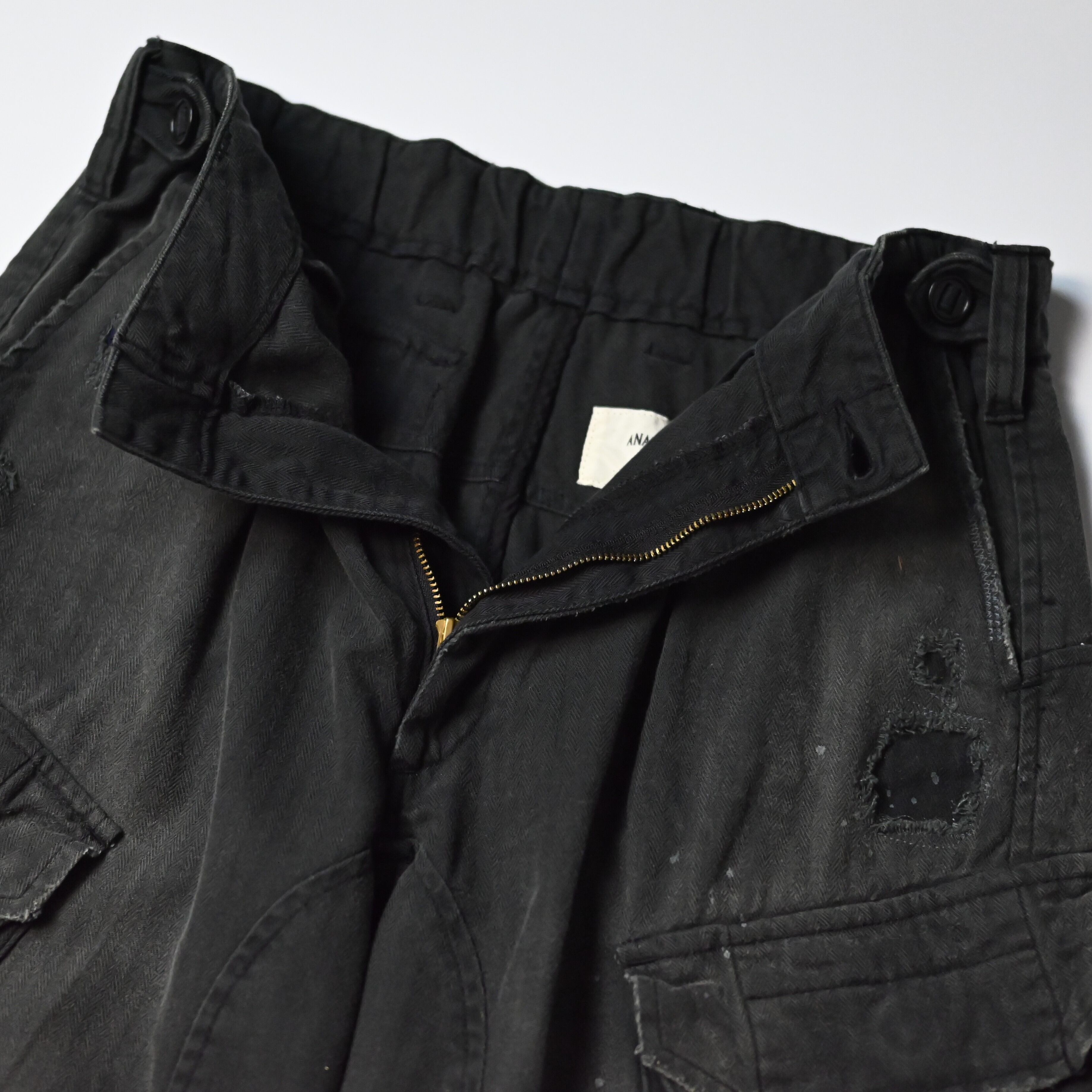 ANACHRONORM / REMAKED HERRINGBONE COMBAT CARGO TROUSERS | GANKO