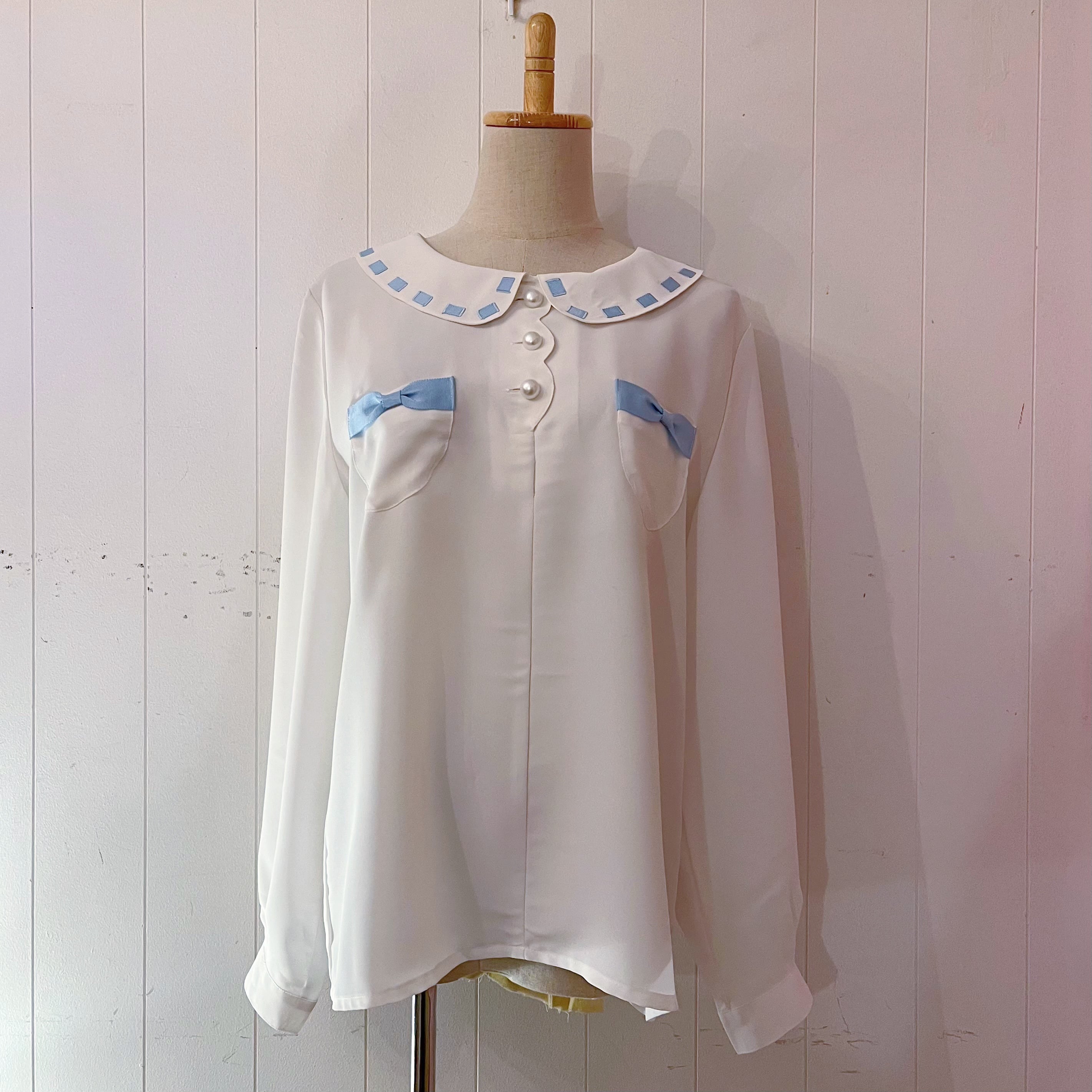 light blue ribbon white blouse