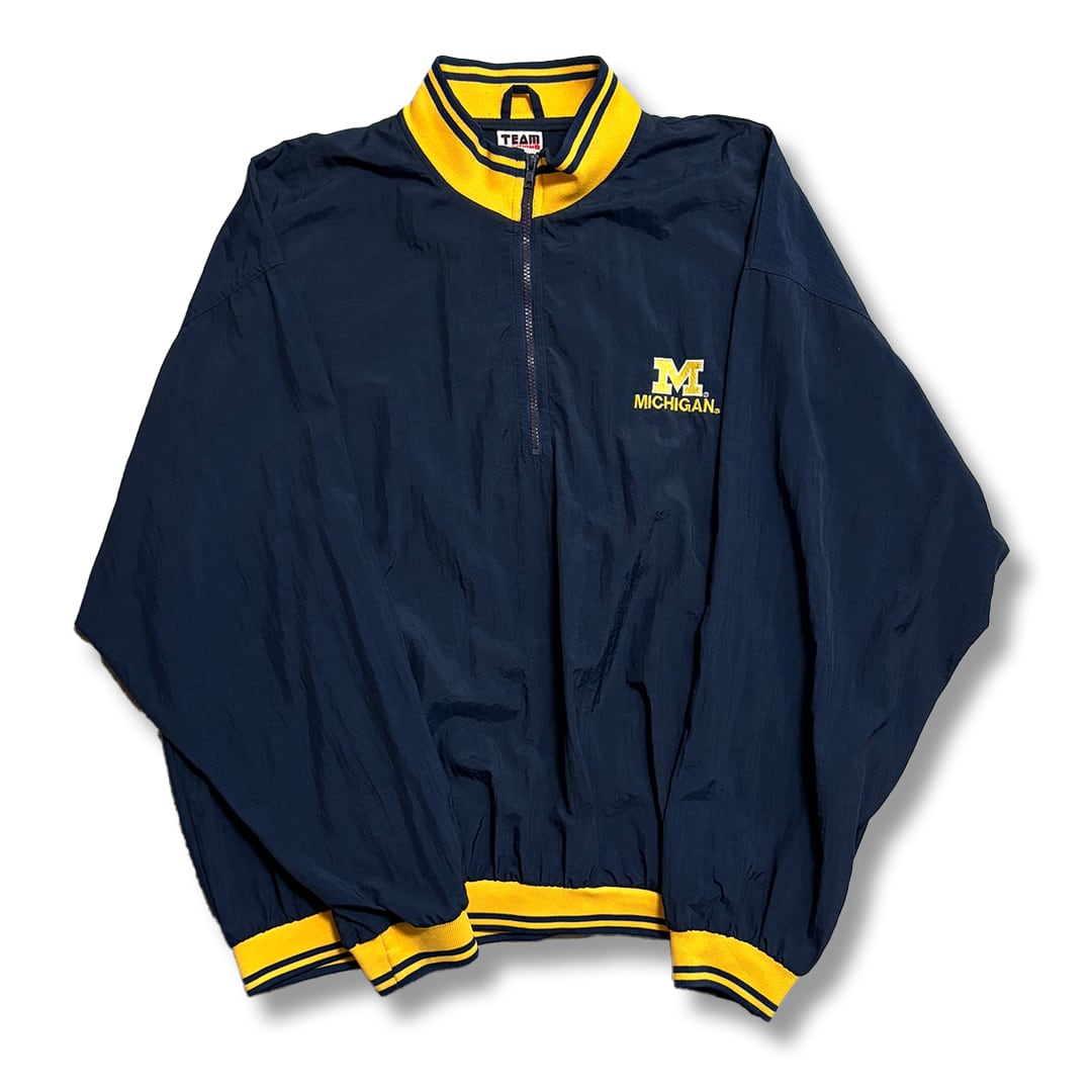 University of Michigan Logo embroidered Half-Zip Nylon Pullover. TEAM EDITION