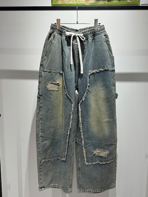 blocking damage curve denim pants