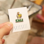 【ピンバッチ】大きな豆を抱えるお兄さん