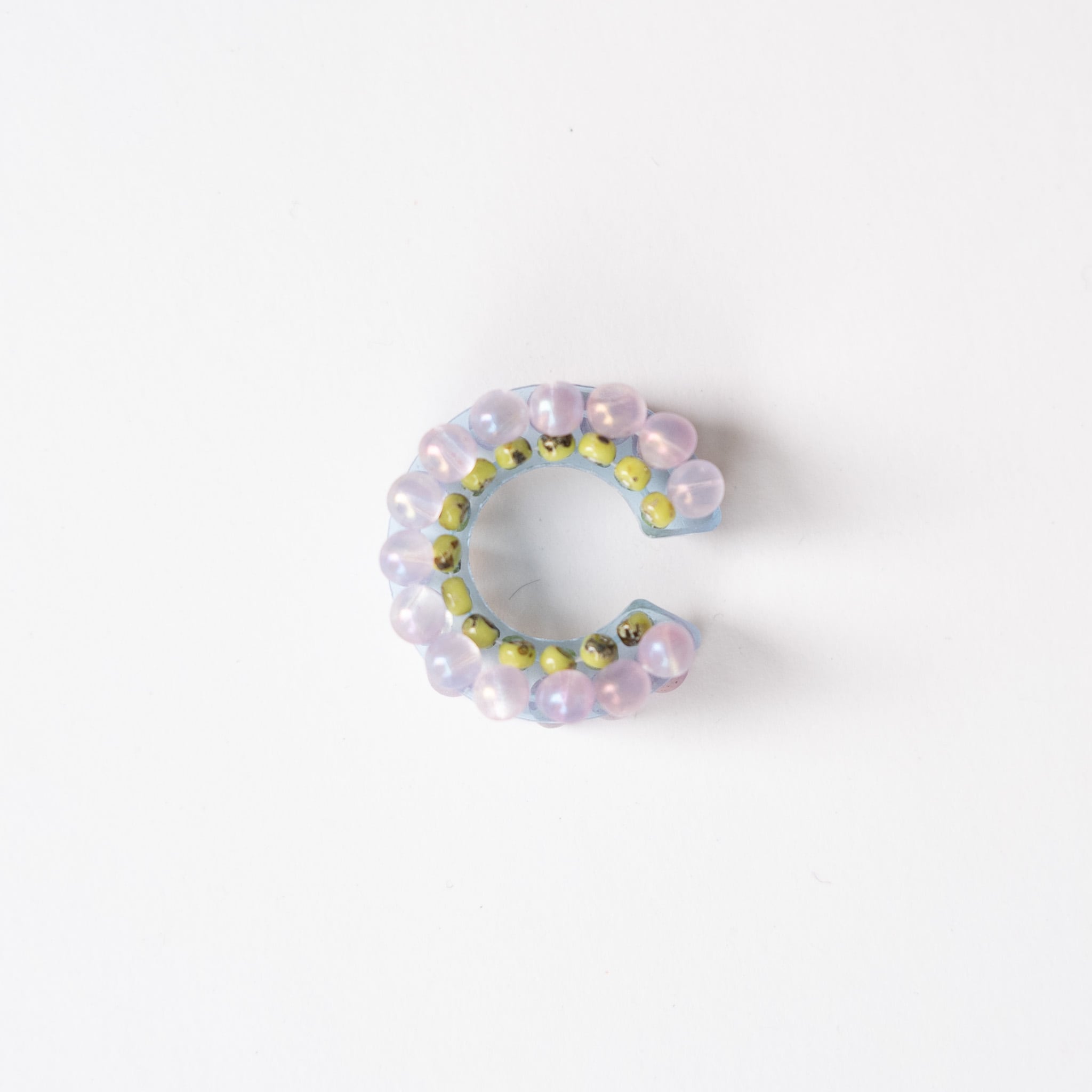 puzzle ring ear cuff [37]