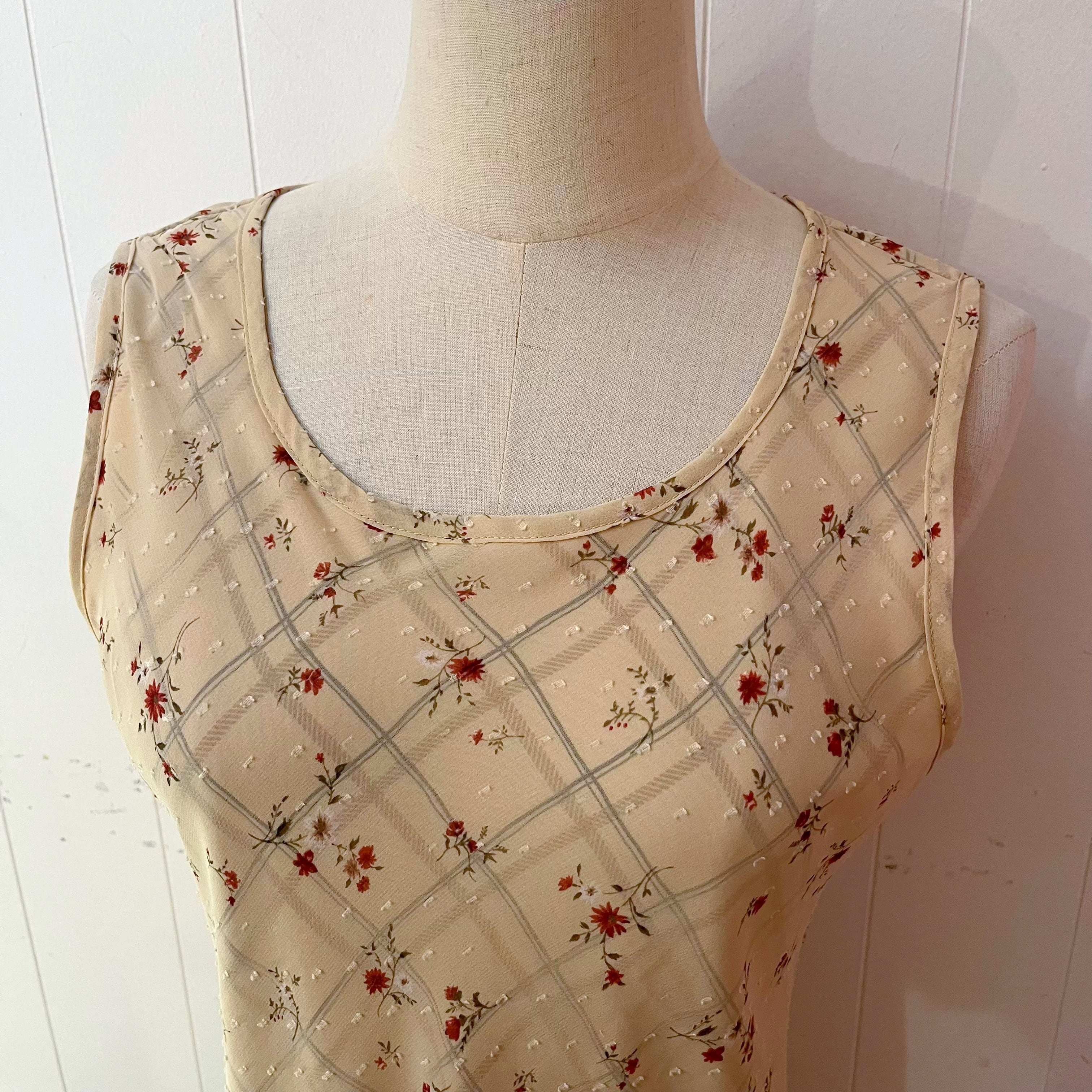 flower check sleeve less one-piece