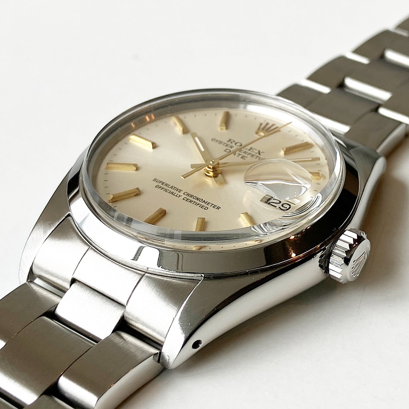 Rolex Oyster Perpetual Date 1500 (54*****) Silver dial with Gold