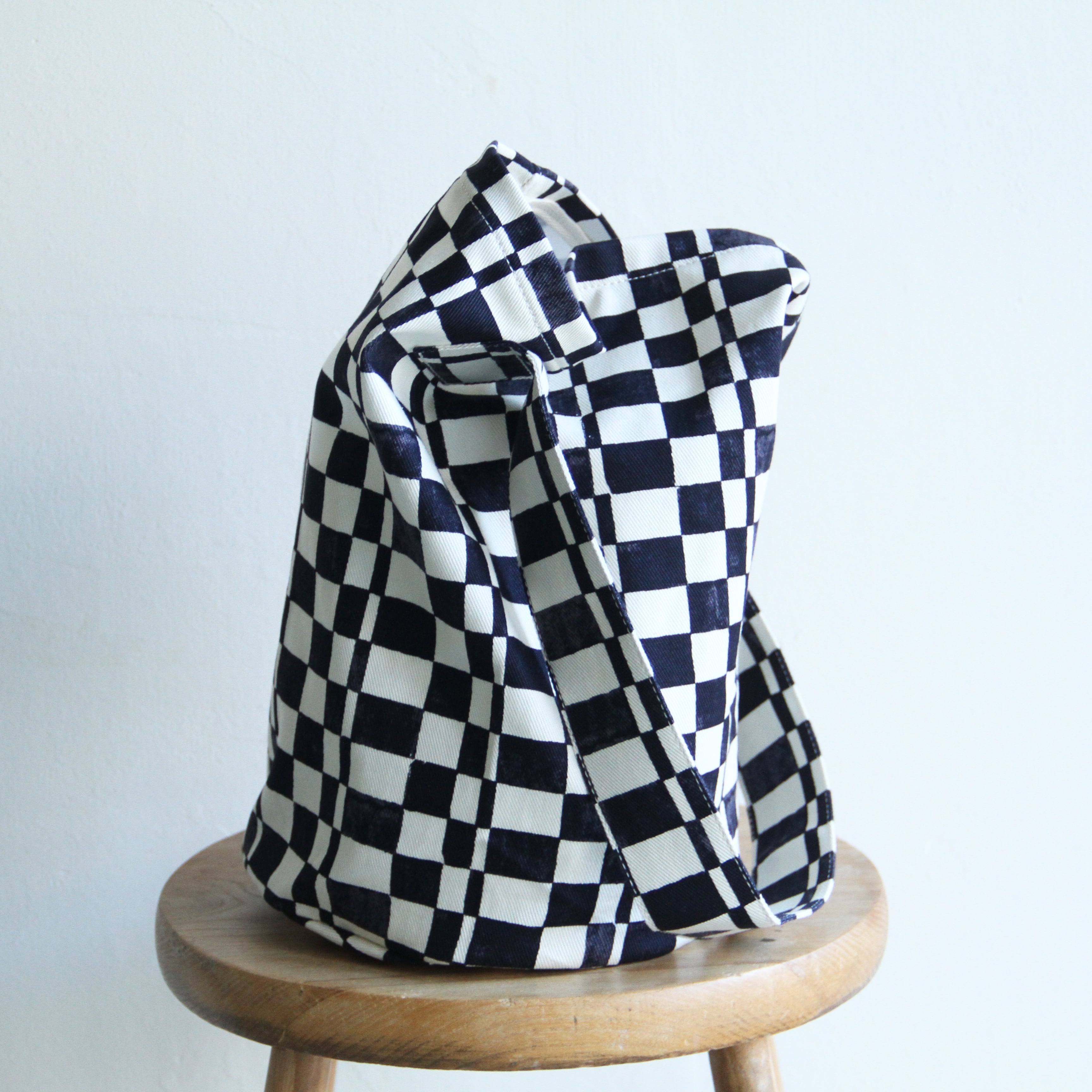 PHEENY Checkered bucket bag | Terminal