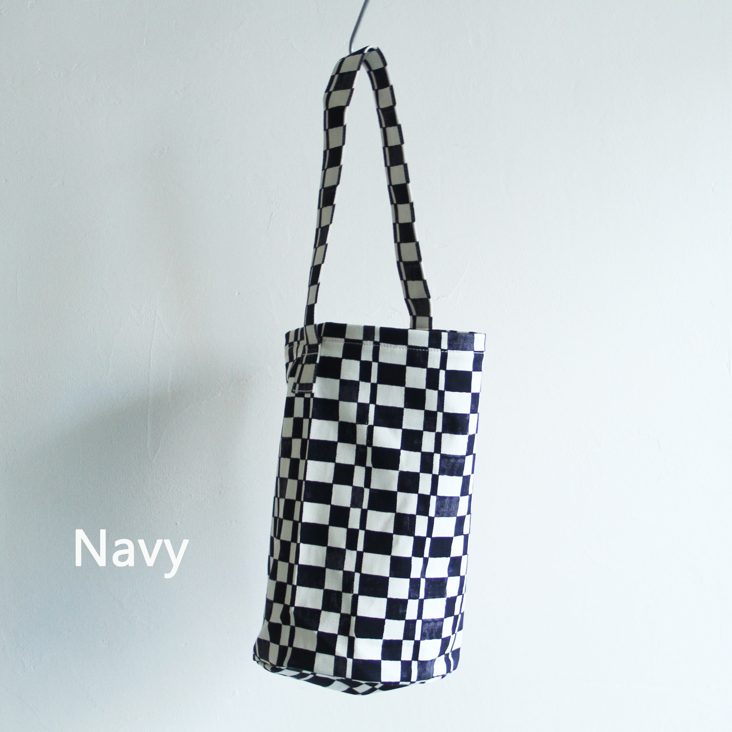 PHEENY Checkered bucket bag | Terminal