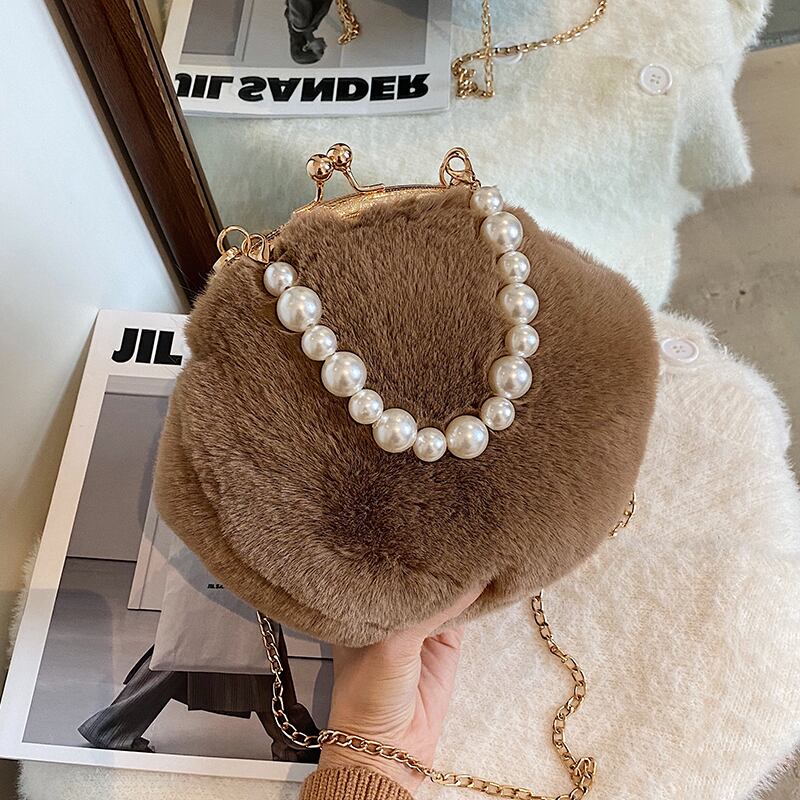 ぬいぐるみハンドバッグ女性2020年秋冬新流行ファッションネットセレブワイルドワンショルダーメッセンジャーヘアリークリップバッグ Tiancai_Wing_Bag16198578824