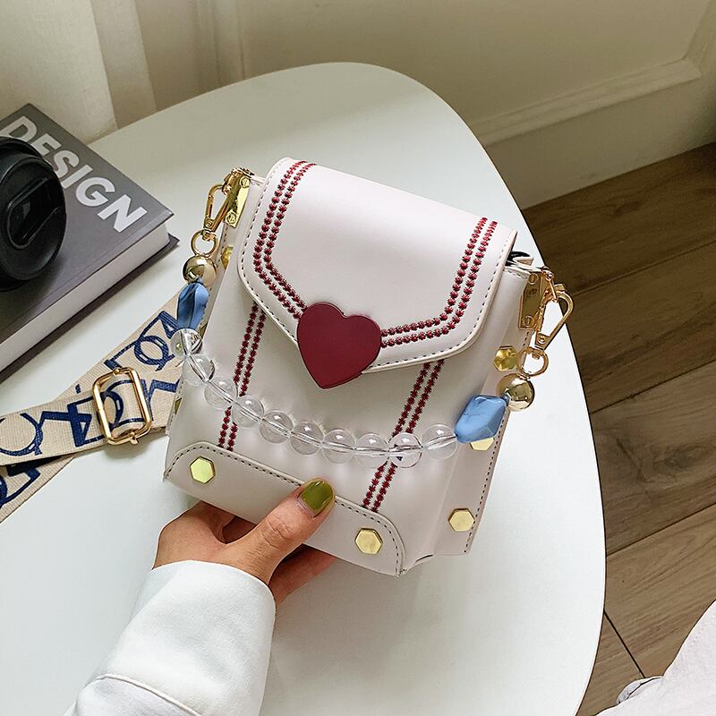 ウエスタンスタイルの小さなバッグハンドバッグ2020人気の新しいトレンディなファッションワンショルダーメッセンジャーバッグネットセレブワイルドテクスチャーバケットバッグ Tiancai_Wing_Bag4554244