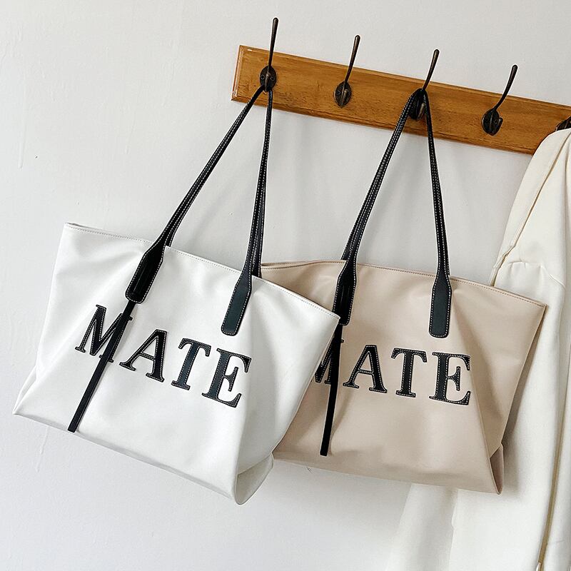 シンプルな大きなバッグ女性のバージョン2020新しいトレンディなファッション大容量カジュアルショルダーバッグネット赤クロスボディトートバッグ Tiancai_Wing_Bag9901204