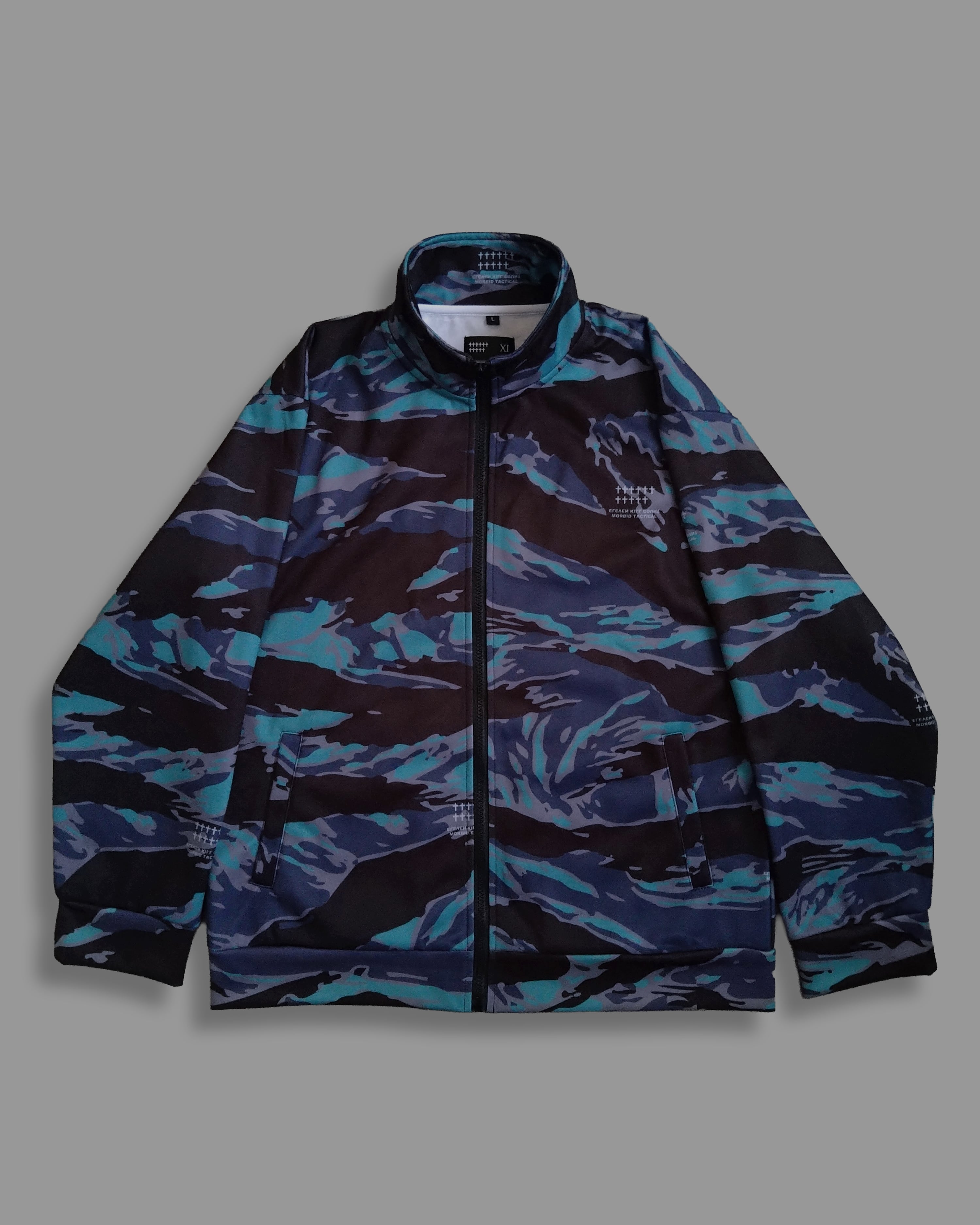 SUPREME SPELLOUT EMBROIDERED RIPSTOP TRACK JACKET-WOODLAND CAMO