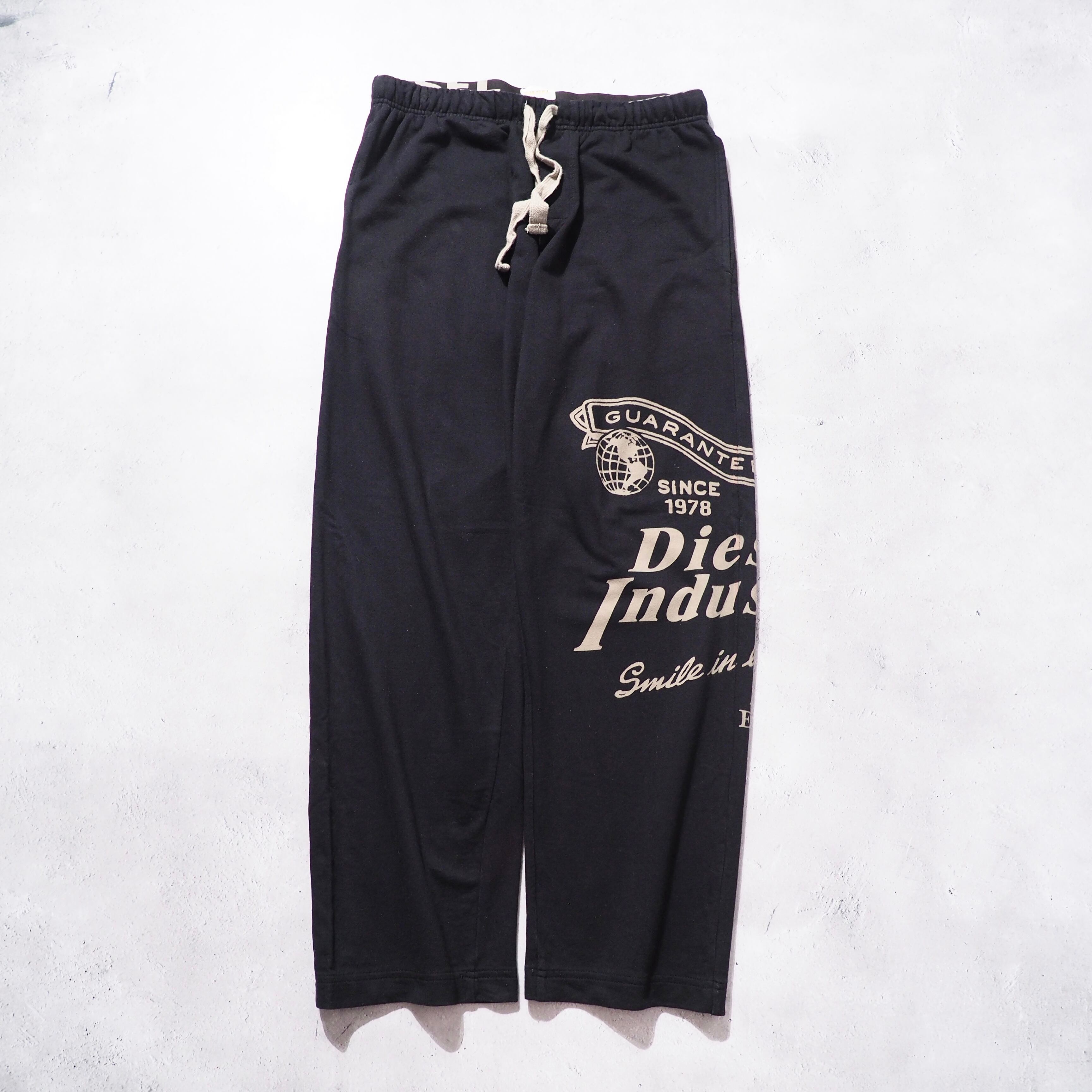 ” DIESEL ” Graphic logo printed wide Sweat pants