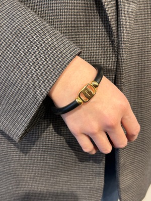 Salvatore Ferragamo/ vintage black × gold Vara bangle.